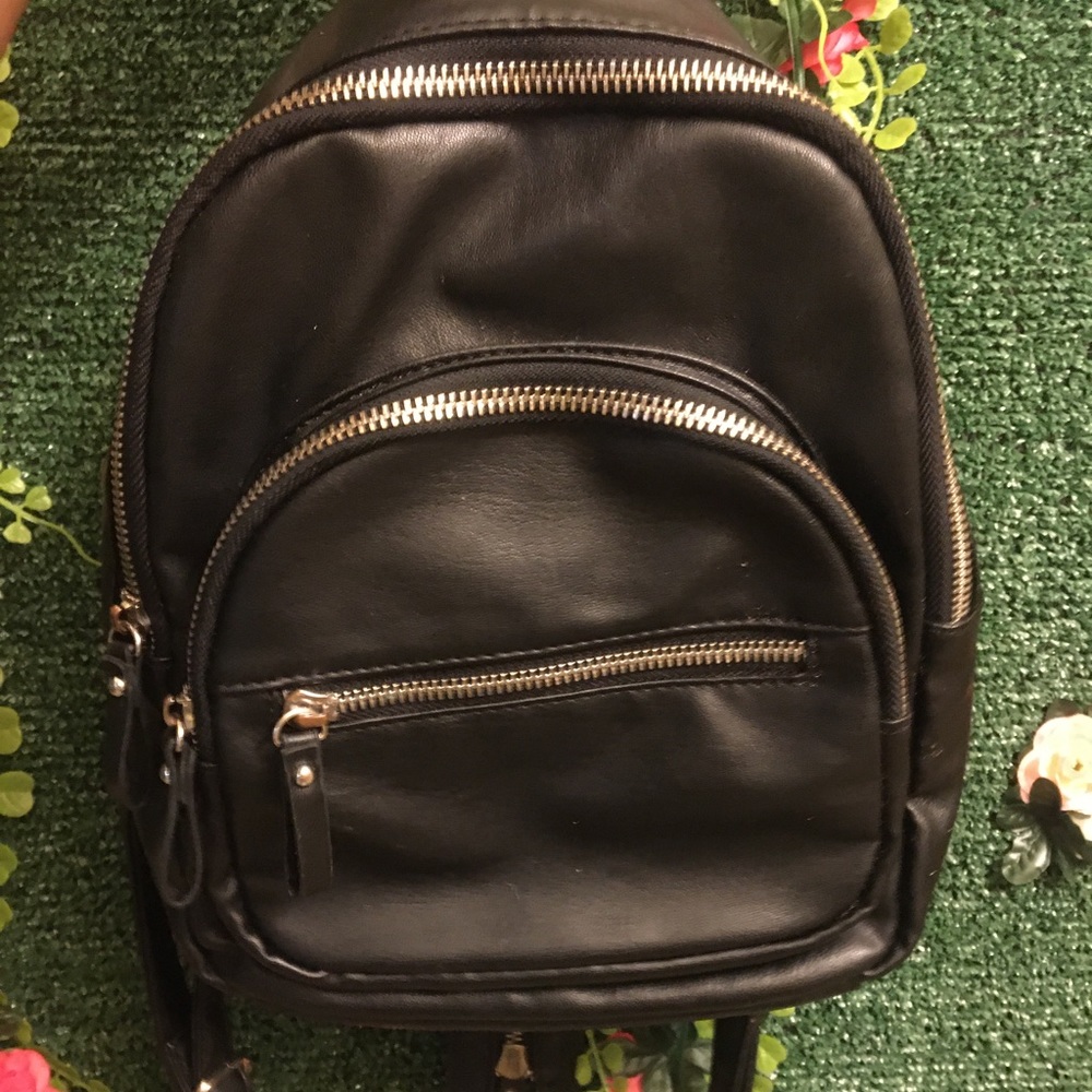 Mini leather backpack.
